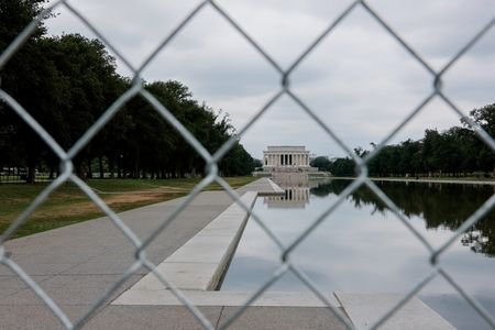 A fence surrounds the Lincoln Memorial Reflecting Pool, in Washington