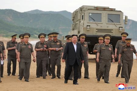 North Korean leader Kim oversees weapons tests