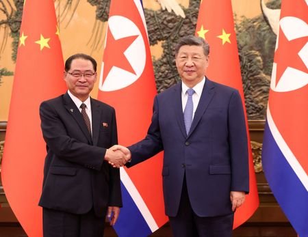 Chinese President Xi Jinping and North Korea's Premier Pak Thae