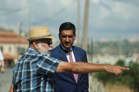 U.S. Representative Ro Khanna (D-CA) speaks with a Palestinian resident