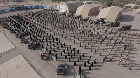 Members of the Islamic Revolutionary Guard Corps (IRGC) attend an