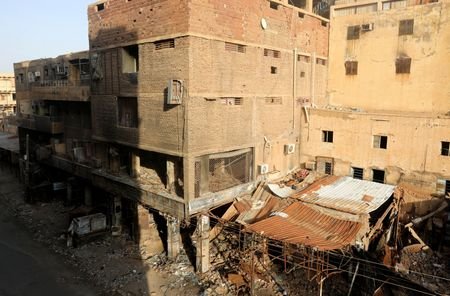 Burnt shops lies down closed in downtown in Khartoum