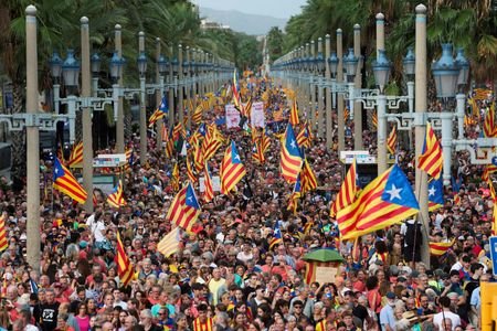 Catalan separatist march to celebrate