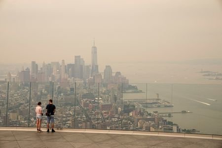 People visit the Edge observation deck as the New York