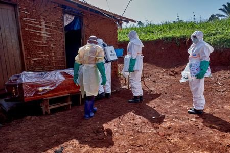 A cracked coffin, a funeral and the hunt for Ebola's