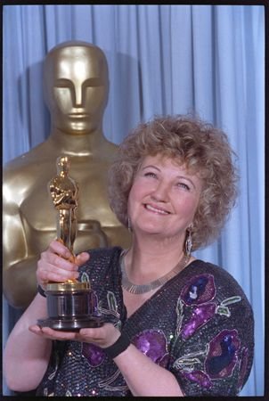 FILE PHOTO: Brenda Fricker holds up her Oscar after winning