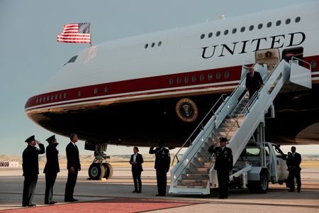 U.S. President Donald Trump deboards Air Force One, in South