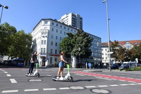 FILE PHOTO: Tier demonstration of an e-scooter in London