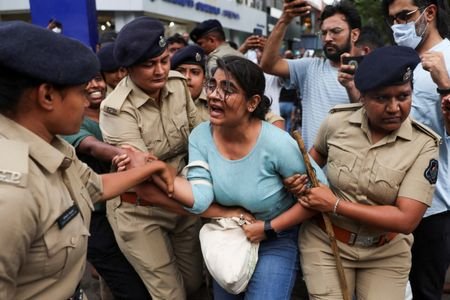 India's Cockroach Janta party supporters protest, in Ahmedabad