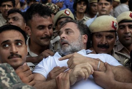 Indian opposition leader Rahul Gandhi is detained by police during