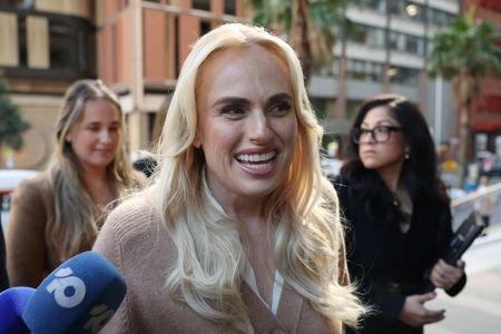 Actor Rebel Wilson arrives at court on the first day