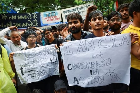 Supporters of India's Cockroach Janta Party (CJP) demonstrate at a