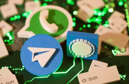 Illustration of 3D printed Facebook, Signal and WhatsApp logos and