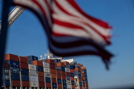FILE PHOTO: A cargo ship full of shipping containers is