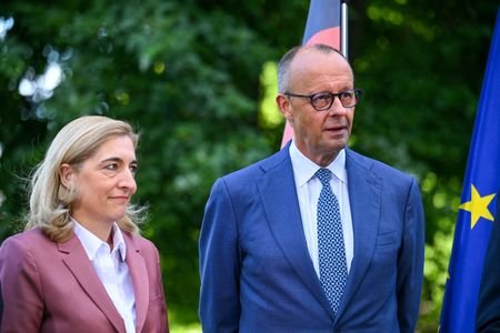 German Chancellor Friedrich Merz delivers a press statement announcing a