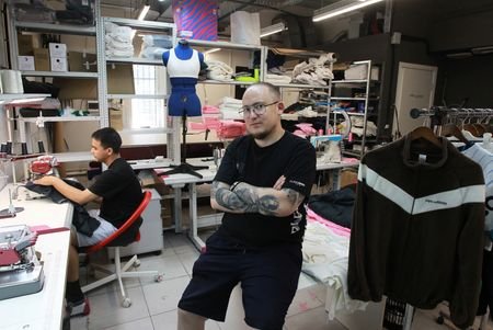 Oleg Kondratyev, co-founder of the clothing brand Airbase, poses for