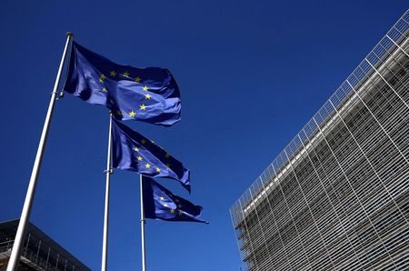 FILE PHOTO: European Union flags flutter in Brussels