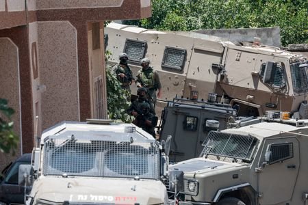 Aftermath of a shooting incident near the village of Tal