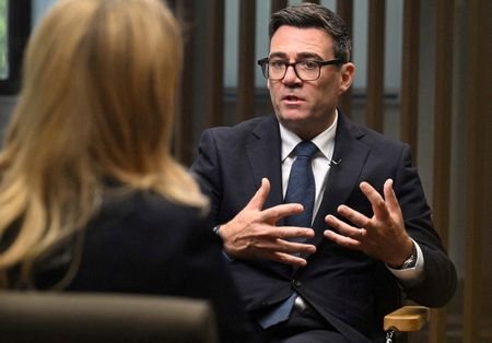 Britain's Prime Minister Andy Burnham speaks during an interview in