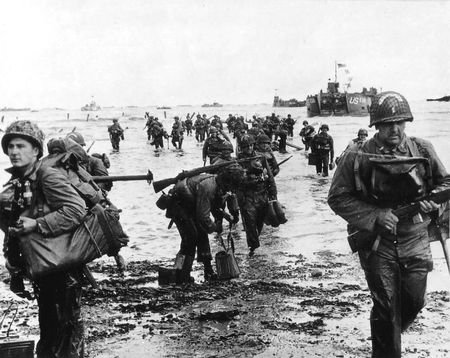 FILE PHOTO: Handout photo of U.S. reinforcements landing on Omaha