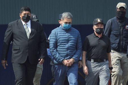 FILE PHOTO: Honduras former President Juan Orlando Hernandez is being