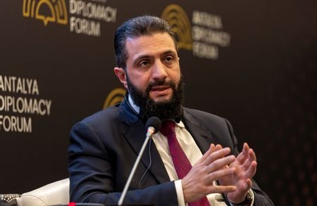 Syrian President Ahmed al-Sharaa speaks during a session at Antalya