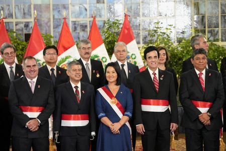Peru’s Fujimori takes power, extending Latin America’s rightward tilt