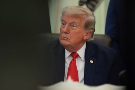 U.S. President Trump makes an announcement with Transportation Secretary Duffy