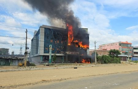 Fire at a mall after it was vandalised following a