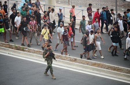 Spain says migrants are returning from Ceuta after 57 die in border rush
