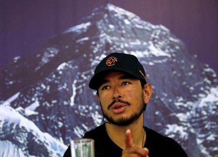 Nirmal Purja, attempting a record to climb fourteen 8000-meter mountain