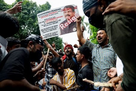 FILE PHOTO: Supporters of India's Cockroach Janta Party (CJP) celebrate