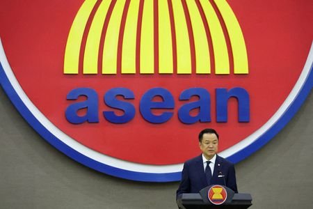 Thailand's Prime Minister Anutin Charnvirakul gives a speech during his