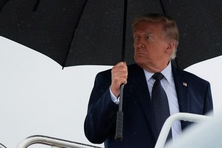 U.S. President Trump boards Air Force One at Joint Base