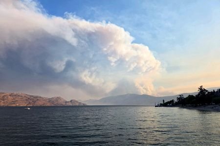 Smoke rises from the Bald Range wildfire northwest of Summerland