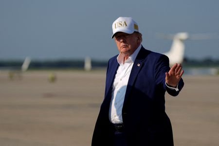 U.S. President Trump disembarks Air Force One at Joint Base