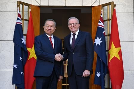 Vietnam General Secretary and President To Lam is greeted by