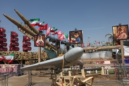 Iranian drone and an Iranian missile system are displayed in