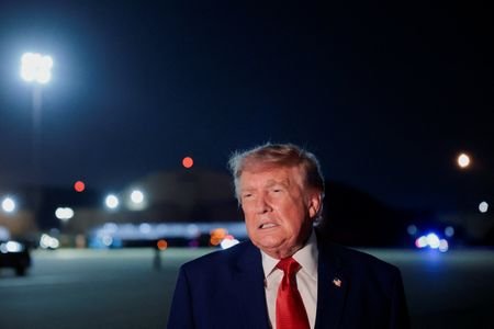 U.S. President Donald Trump disembarks Air Force One at Joint
