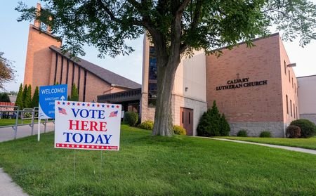 Signs greet voters as polls open in Connecticut, Minnesota, Vermont,