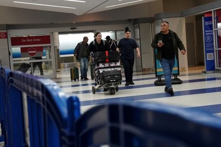 FILE PHOTO: Trump reinstates U.S. travel ban, bars citizens of