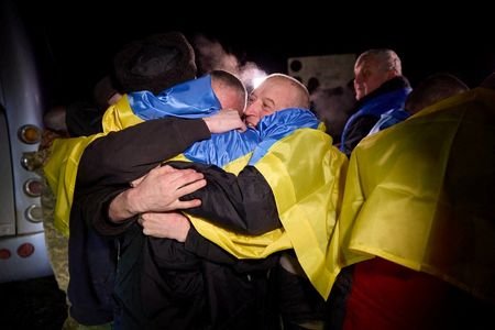 Ukrainian POWs react after a swap at an unknown location