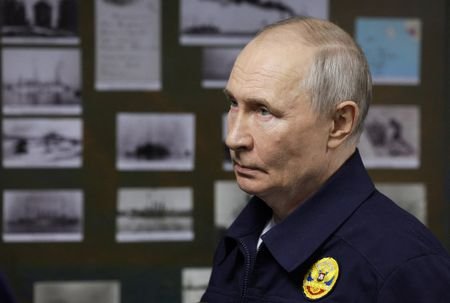 Russian President Vladimir Putin observes a military drill of Pacific