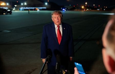 U.S. President Donald Trump disembarks Air Force One at Joint