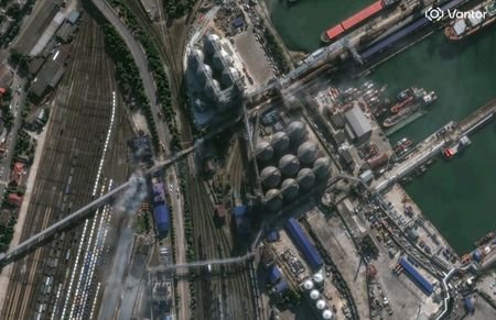 A satellite image shows damage to a grain conveyor, following