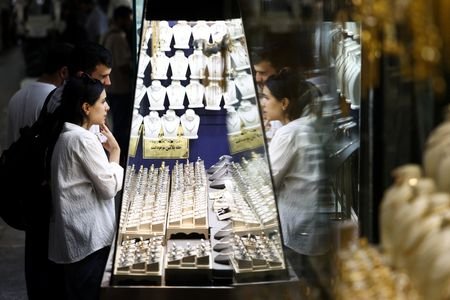 People shop in the Grand Bazaar, in Tehran