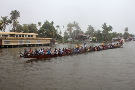 Rowers from the United Boat Club train on the Pamba