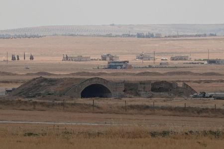 Damage following strikes at the Abu al-Duhur base