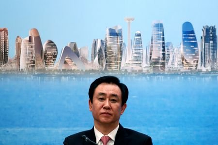 China Evergrande Group Chairman Hui Ka Yan attends a news