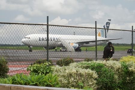 Deportees from the United States arrive at Roberts International Airport,